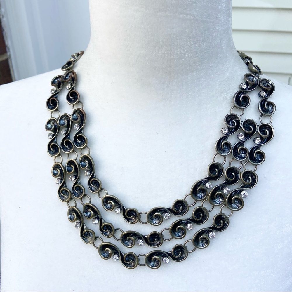 Dramatic serpentine rhinestone studded necklace